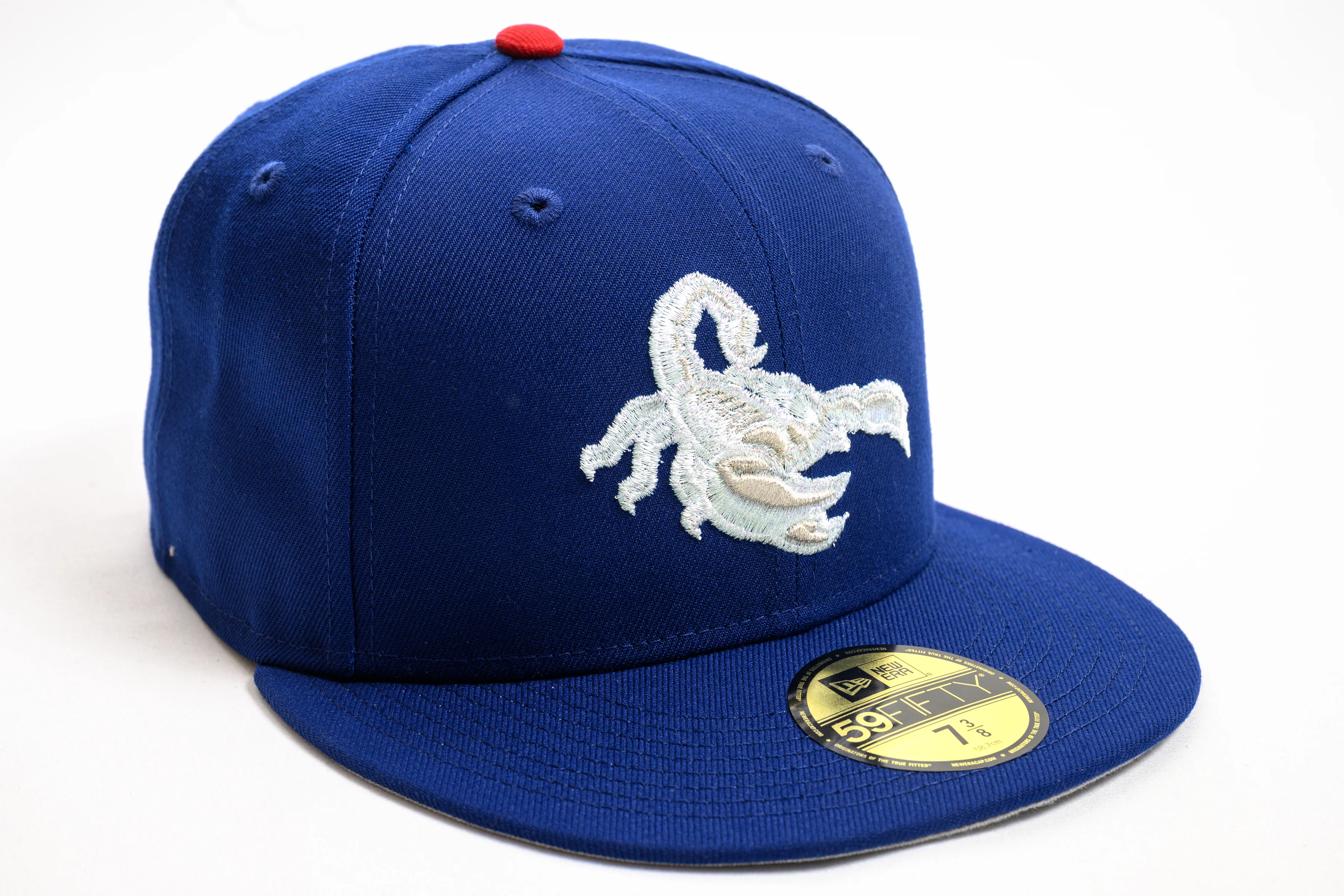 NEW ERA "BUFFALO KIDS" SCOTTSDALE SCORPIONS FITTED HAT (LIGHT ROYAL/SCARLET)