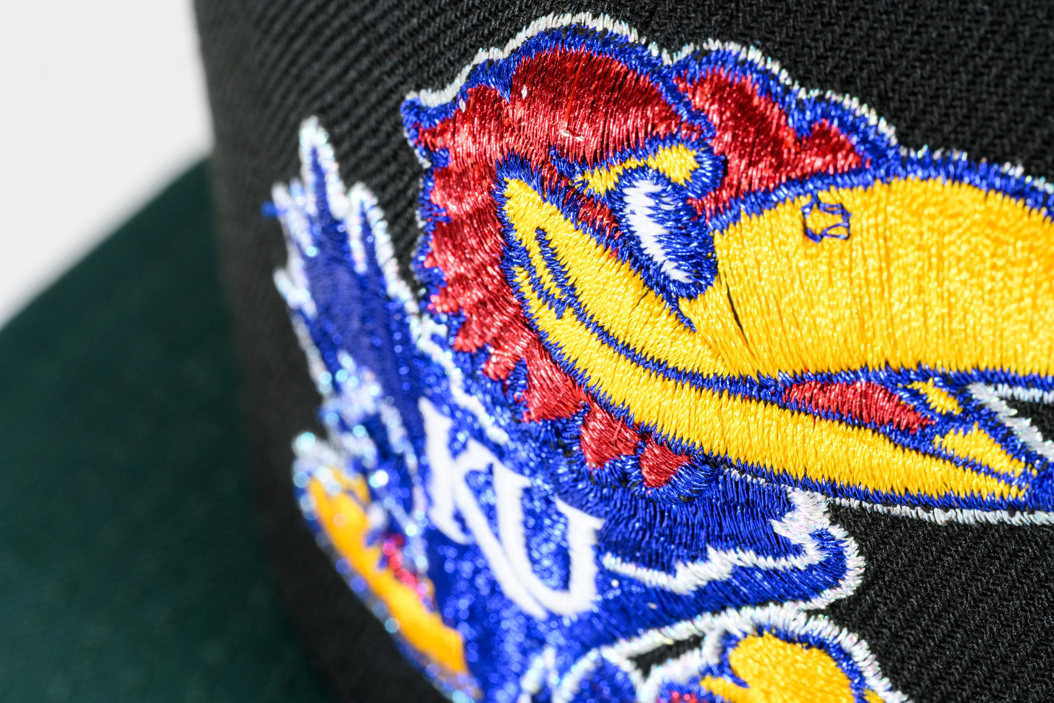 NEW ERA "FRE HAWKS" KANSAS JAYHAWKS FITTED HAT (BLACK/ DARK GREEN/LIGHT ROYAL) - Image 6