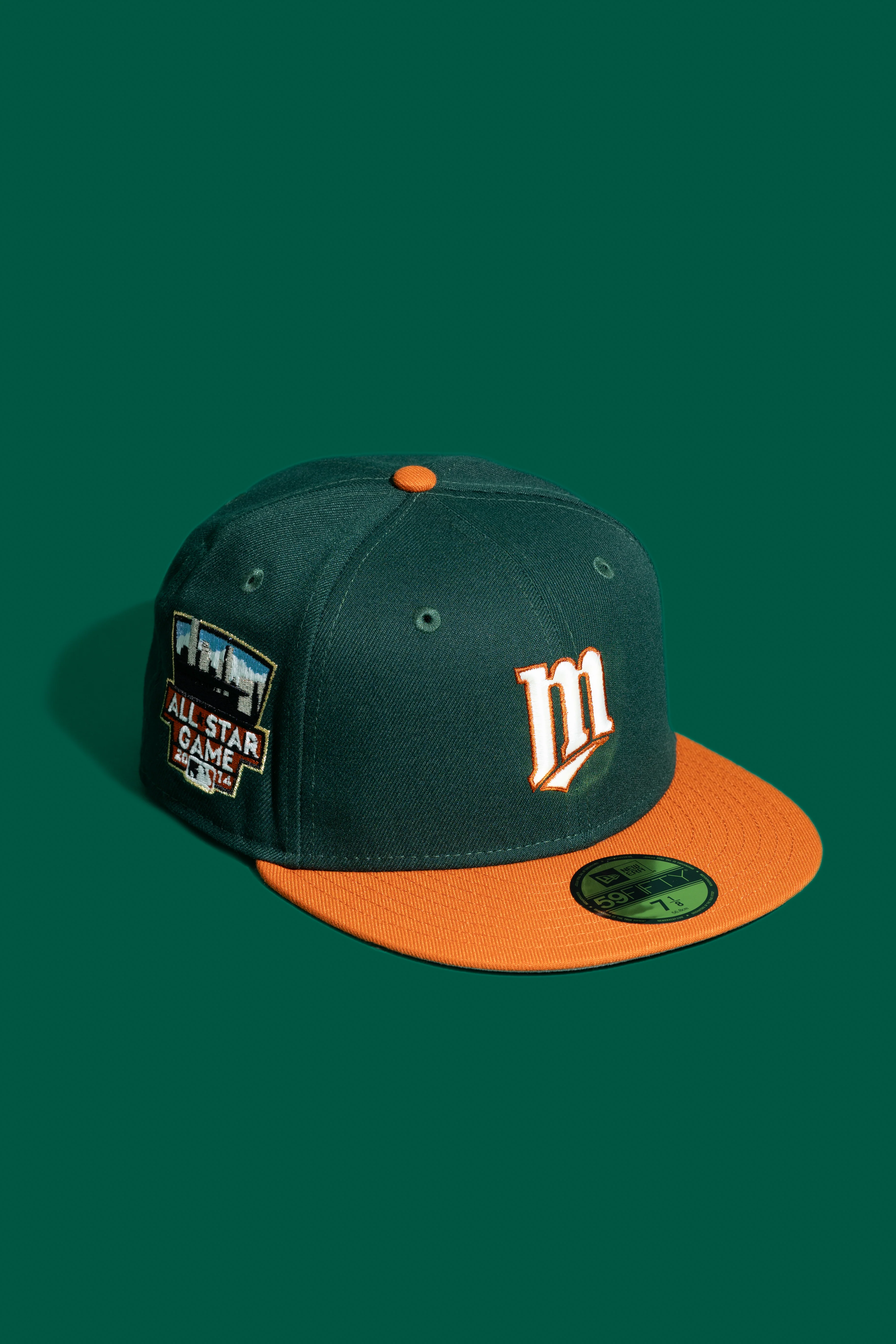 NEW ERA "LETTERMAN" MINNESOTA TWINS FITTED HAT (DARK GREEN/ORANGE)